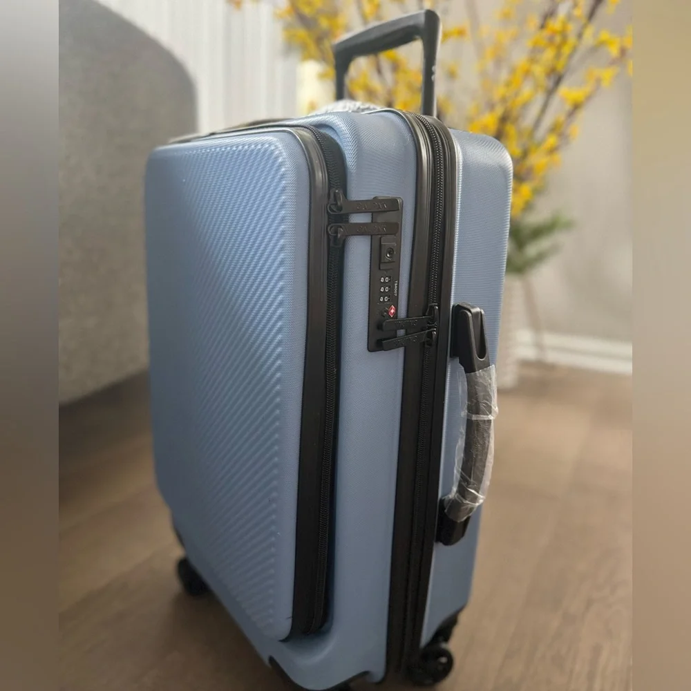 New! 🧳✈️🌎 CALPAK 22” Hardside Carry-on Spinner With Front Pocket in Amalfi Blu